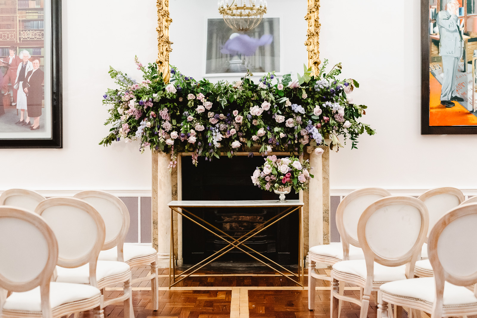 Wedding ceremony setup in front of a fireplace
