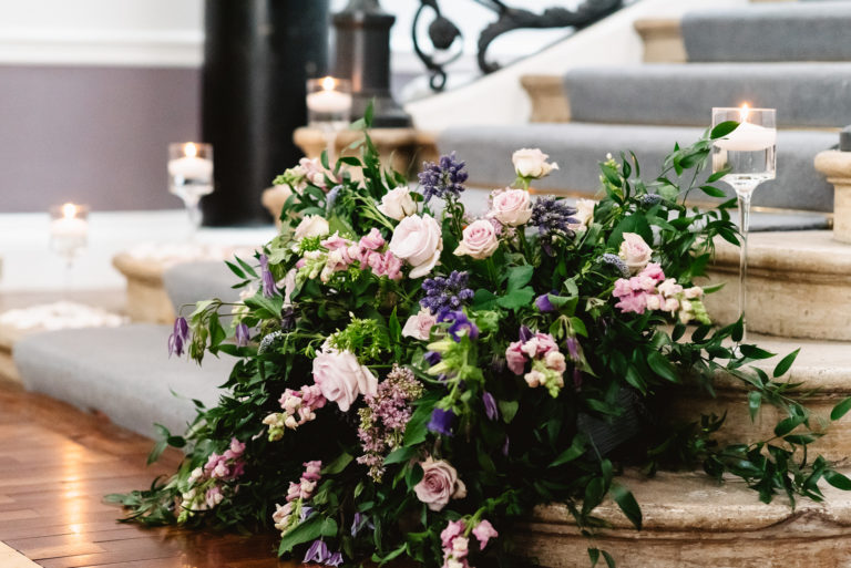 Staircase wedding floral arrangement