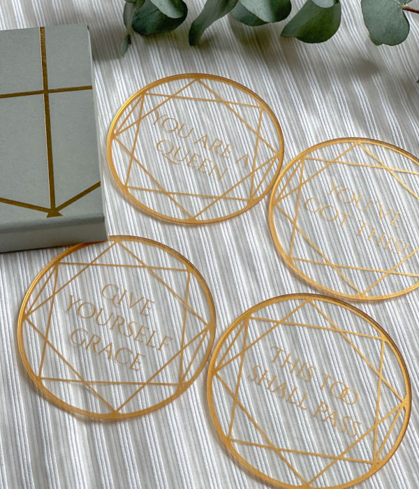 gold and clear acrylic coaster